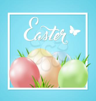 Easter card with eggs and green grass in white frame on a blue background