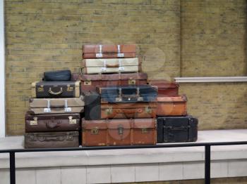 Pile of old vintage suitcases - luggage