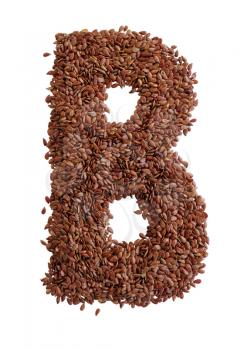 Letter B made with Linseed also known as flaxseed isolated on white background. Clipping Path included