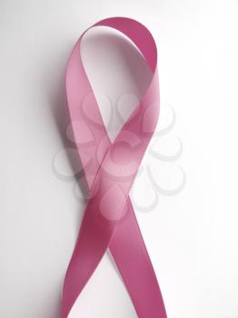 Pink ribbon against cancer isolated on white background. Clipping Path included