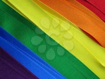 Gay Flag flag or banner made with red, orange, yellow, green, blue and purple ribbons