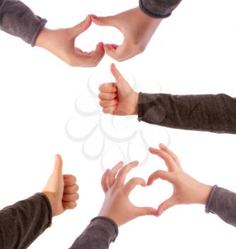 Several heart gestures, excellent, made by a childish girlish hand on a white background