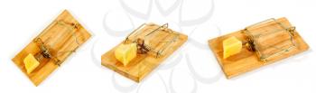 conceptual picture of a mousetrap with a piece of cheese on a white background in several different positions