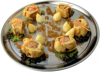 Royalty Free Photo of a Tray of Pigs in a Blanket