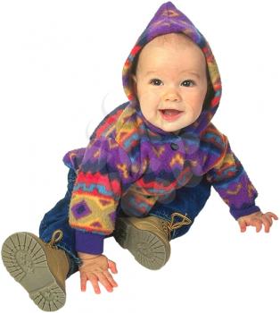 Royalty Free Photo of an Infant Child Sitting Happily 