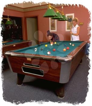 Royalty Free Photo of a Game of Billiards Being Played.