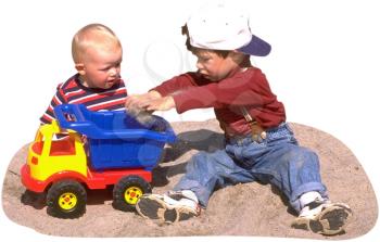Royalty Free Photo of Two Children Playing in the Sand