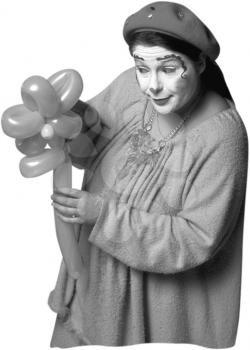 Royalty Free Photo of a Clown Holding Balloons