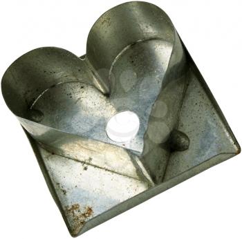 Royalty Free Photo of a Tin Cookie Cutter in the Shape of a Heart