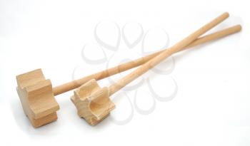 Wood beaters placed on white background.