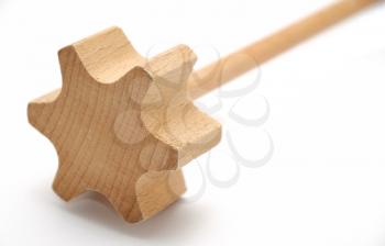 Wood beater placed on white background.