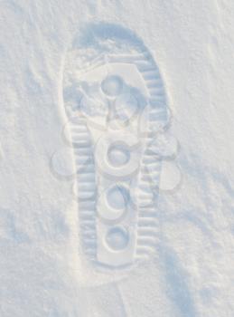 Image of footprint in snow.