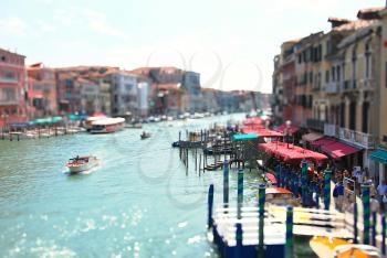 Tilt shift shot of gondola in Venice, Italy.