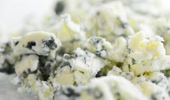 Macro Shot of a Grated Blue Cheese with Visible Cultures of the Mold Penicillium.