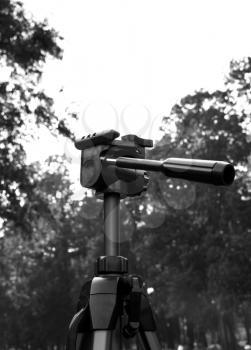 Tripod in the field without photo camera on it