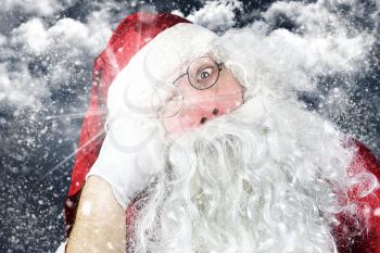 Close up of Santa Claus in the Christmas Night Punched in the Face