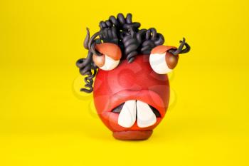 Easter Egg Cartoonish Character With Plasticine Eyes, Mouth and Hair Having an Expressive Face
