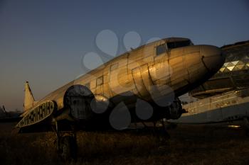 Old Rusted Airplane Abandoned in Junkyard at the Airport