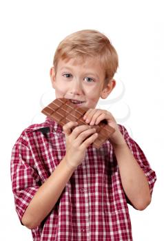 boy eats chocolate