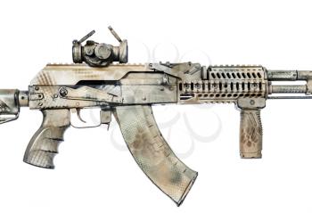 Close-up shot of Kalashnikov rifle with collimator and fire control handle, automatic weapons isolated on white background. Gun is painted desert camouflage