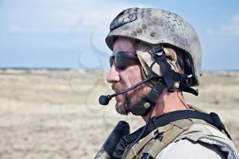 Bearded SEAL team member in the desert
