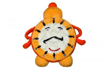 Knitted handwork in the form of ridiculous childrens alarm clock