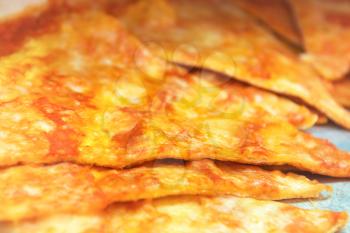 Pizza slices on the plate. Food background