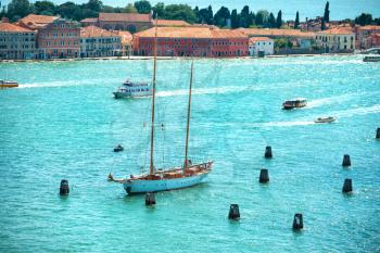 View from Campanile bell tower on yacht in Grand Canal.  Sunny day in Venice, Italy.