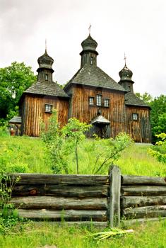 Wooden church with the wooden fence. Kiev, Ukraine.
