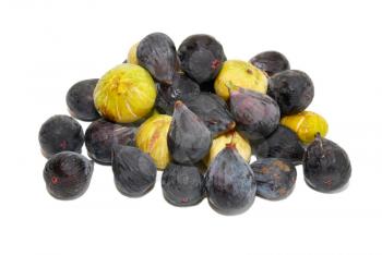 Stack of black and yellow figs isolated on white.