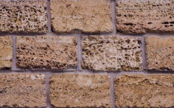 Macro image of fouling brown brick. Used as a background.