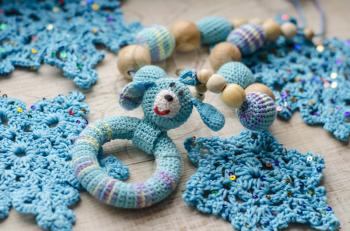 Necklace made from knitted dog and toys for the baby sitting in a sling. Sling necklace.