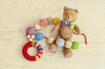 Necklace made from knitted beads and toys for the baby sitting in a sling. Knitted beads. Sling necklace.Vintage teddy bear.