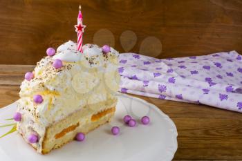 Slice of meringue birthday cake with apricot, place for text. Birthday card. Birthday Cake. Meringue cake. Pavlova
