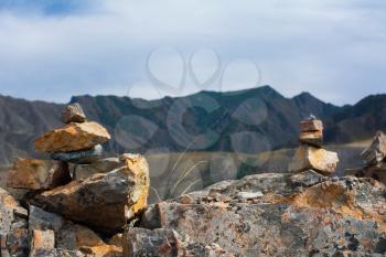 Inuksuk and mountains in the background in Siberian Altai Mountains, Russia
