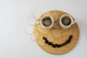 Funny two coffee cups on wooden background. Coffee cup. Coffee mug. Morning coffee. Cup of coffee. Coffee break. Strong coffee.