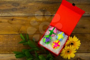 Easter eggs in red box. Easter background. Easter eggs. Easter. Easter symbol.  Easter card. Easter greetings. Happy Easter. Copy space
