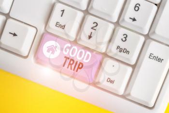 Word writing text Good Trip. Business photo showcasing A journey or voyage,run by boat,train,bus,or any kind of vehicle White pc keyboard with empty note paper above white background key copy space