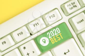 Text sign showing 2020 Best. Business photo text Highest quality done in all fields preparing for the next year White pc keyboard with empty note paper above white background key copy space