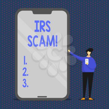 Conceptual hand writing showing Irs Scam. Concept meaning involve scammers targeting taxpayers pretending be Internal Service Man Presenting Huge Smartphone while Holding Another Mobile
