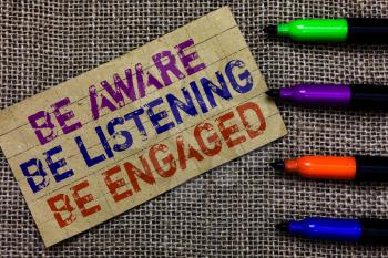 Handwriting text writing Be Aware Be Listening Be Engaged. Concept meaning take attention to actions or speakers Paperboard computer mouse jute background Expressing ideas typing needs