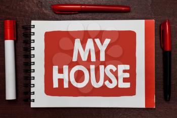 Text sign showing My House. Conceptual photo A place or building where i live with the people whom i loved Important ideas highlighted notebook markers wooden table reminder message