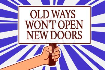 Text sign showing Old Ways Won t not Open New Doors. Conceptual photo be different and unique to Achieve goals Man hand holding poster important protest message blue rays background