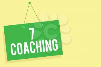 Word writing text 7 Coaching. Business concept for Refers to a number of figures regarding business to be succesful Green board wall message communication open close sign yellow background