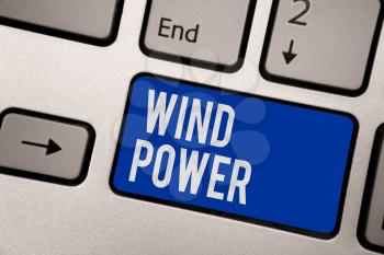 Writing note showing Wind Power. Business photo showcasing use of air flowto provide mechanical power to turn generators Keyboard blue key Intention computer computing reflection document