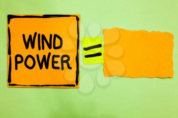 Conceptual hand writing showing Wind Power. Business photo text use of air flowto provide mechanical power to turn generators Orange paper notes reminders equal sign important messages
