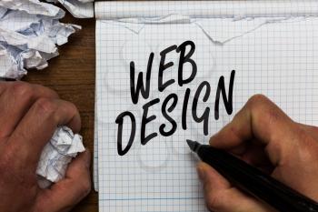 Text sign showing Web Design. Conceptual photo who is responsible of production and maintenance of websites Man holding marker notebook crumpled papers ripped pages mistakes made