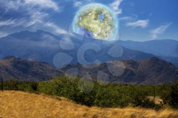 Mountain Vista. Terraformed moon seen from the Earth. 3D rendering