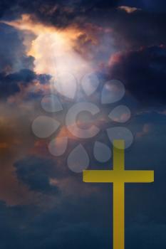 Cross in stormy sky with rays. Spiritual composition. 3D rendering 