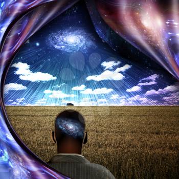 Man with galaxy inside his head stands on a field of wheat. Shining galaxy in the sky. 3D rendering